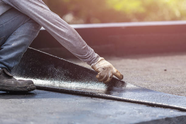 Professional Waterproofing technician working in Jefferson, NC